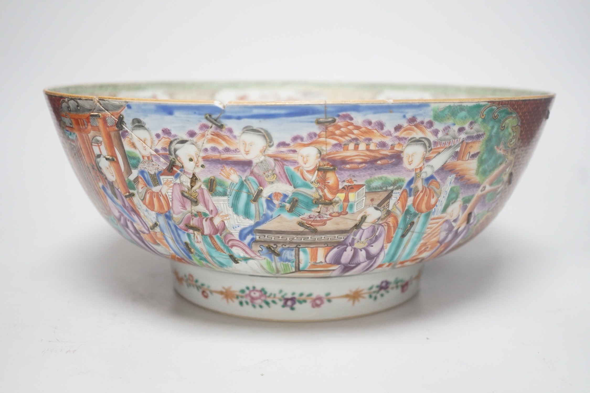 An 18th century Chinese export famille rose ‘mandarin’ punch bowl, 31cm diameter (af)